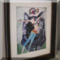 A17. Framed “Metamorphosis” painting by Abrosimova. 16”h x 12.5”w - $44 